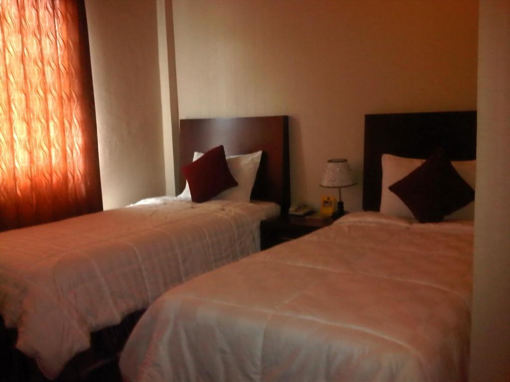 Grand Duta Hotel Palu Værelse billede