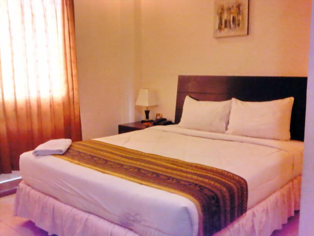 Grand Duta Hotel Palu Værelse billede